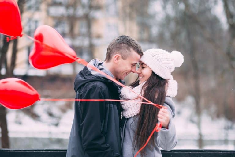 Couple with love balloons