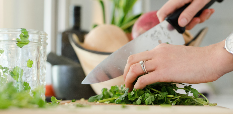 Person cutting vegetables