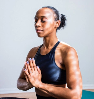 Fit woman in meditation