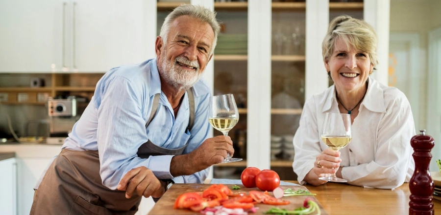 Old couple drinking wine