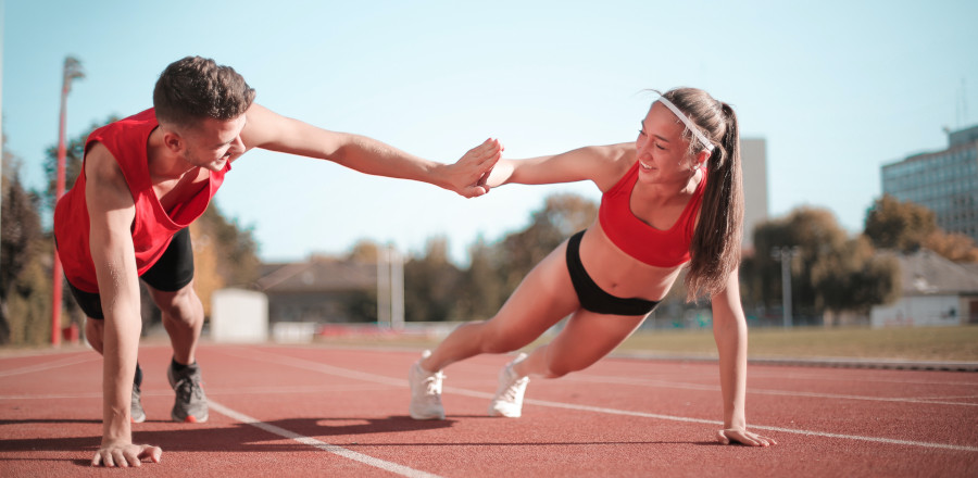 Running couple on a track