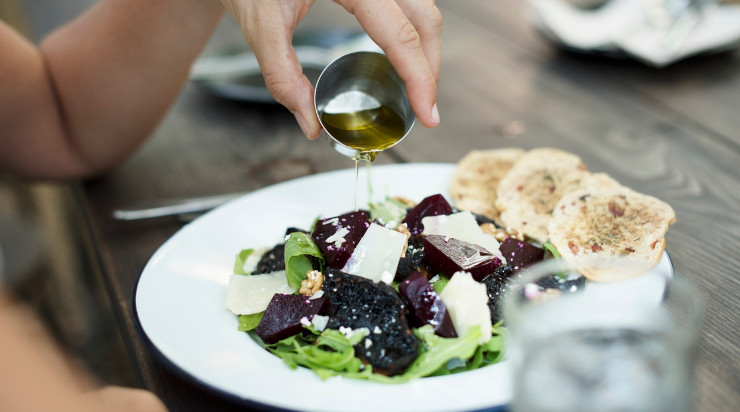 Veggie salad with liquid dressing on top