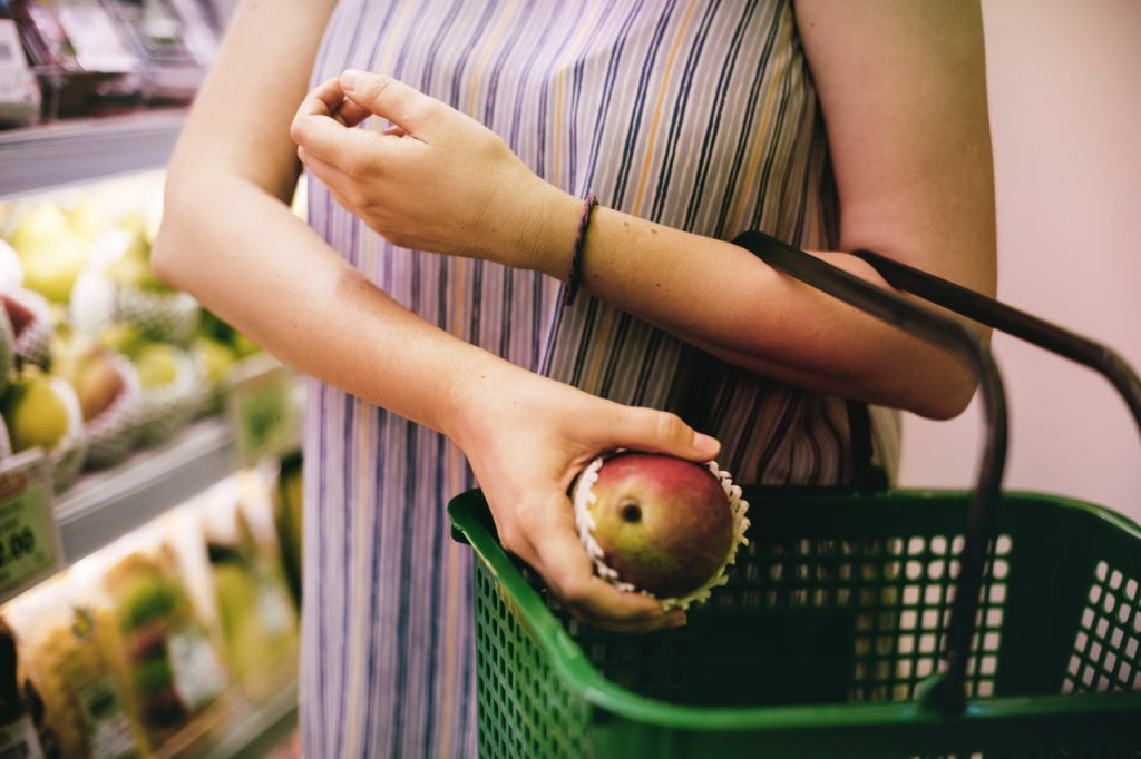 Woman shopping for fruits