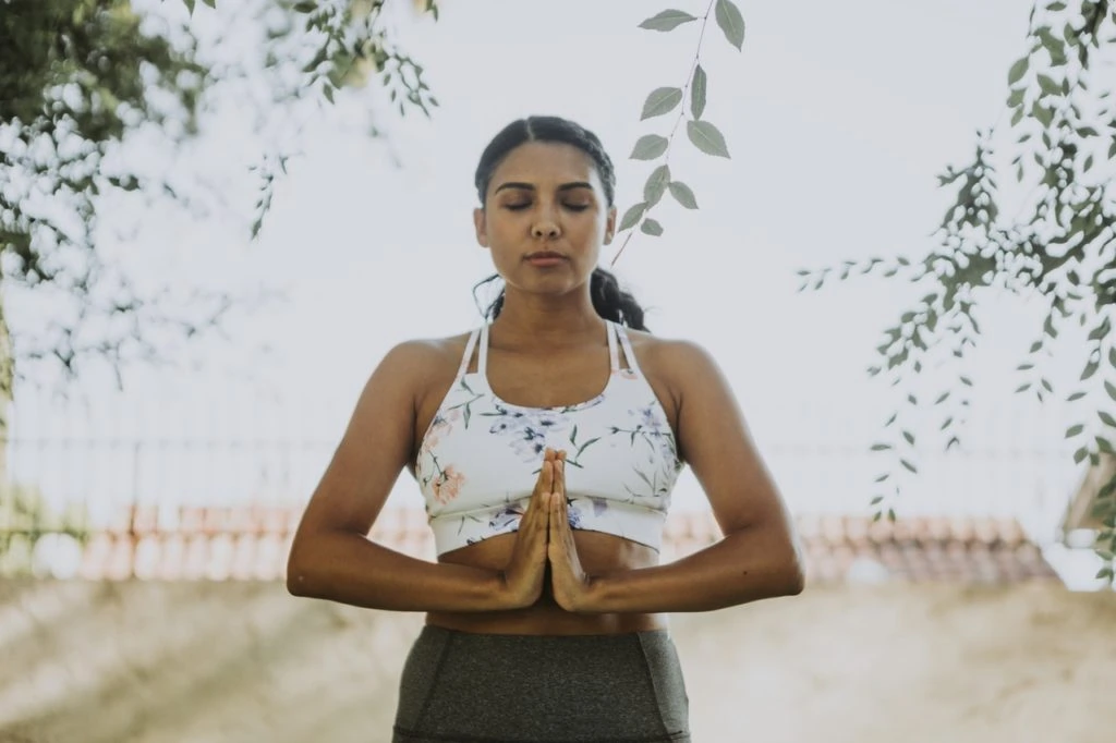 A woman doing peaceful exercise