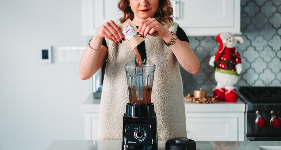 Woman mixing powder juices