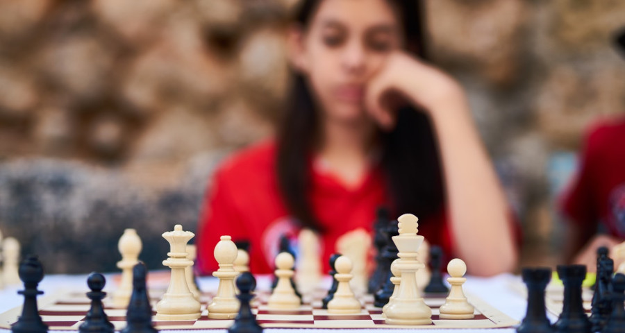 Woman playing chess