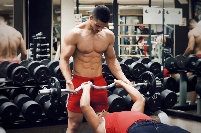 Men training at the gym