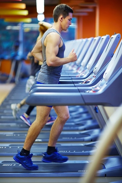 Running cardio exercises at the gym