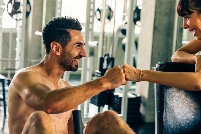 Gym fitness buddies happy and energetic